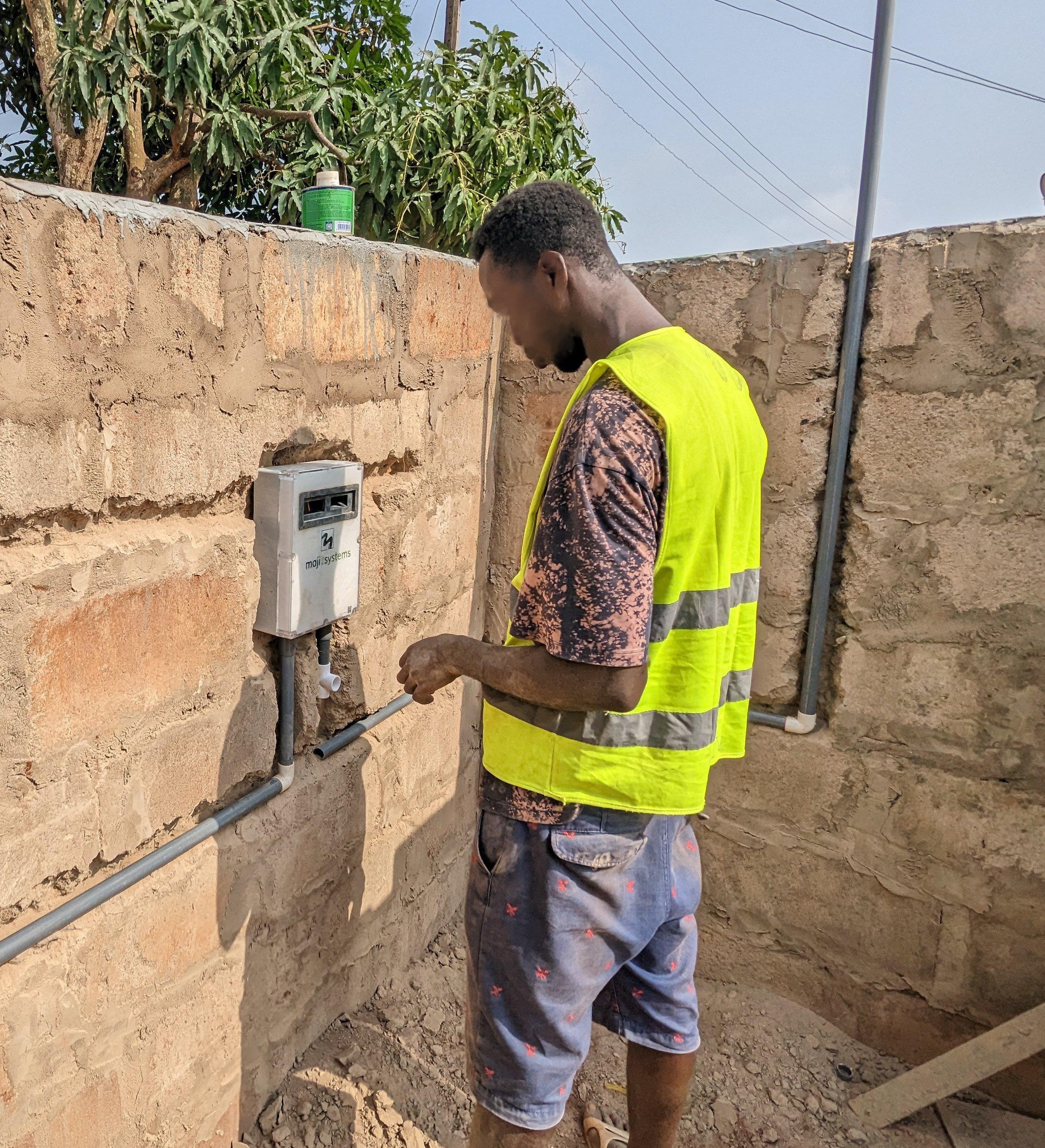 A Maji Community Dispenser being installed on site